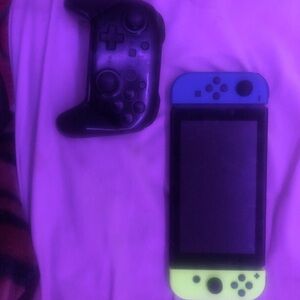 Nintendo Switch with Blue and Yellow Joy-Con